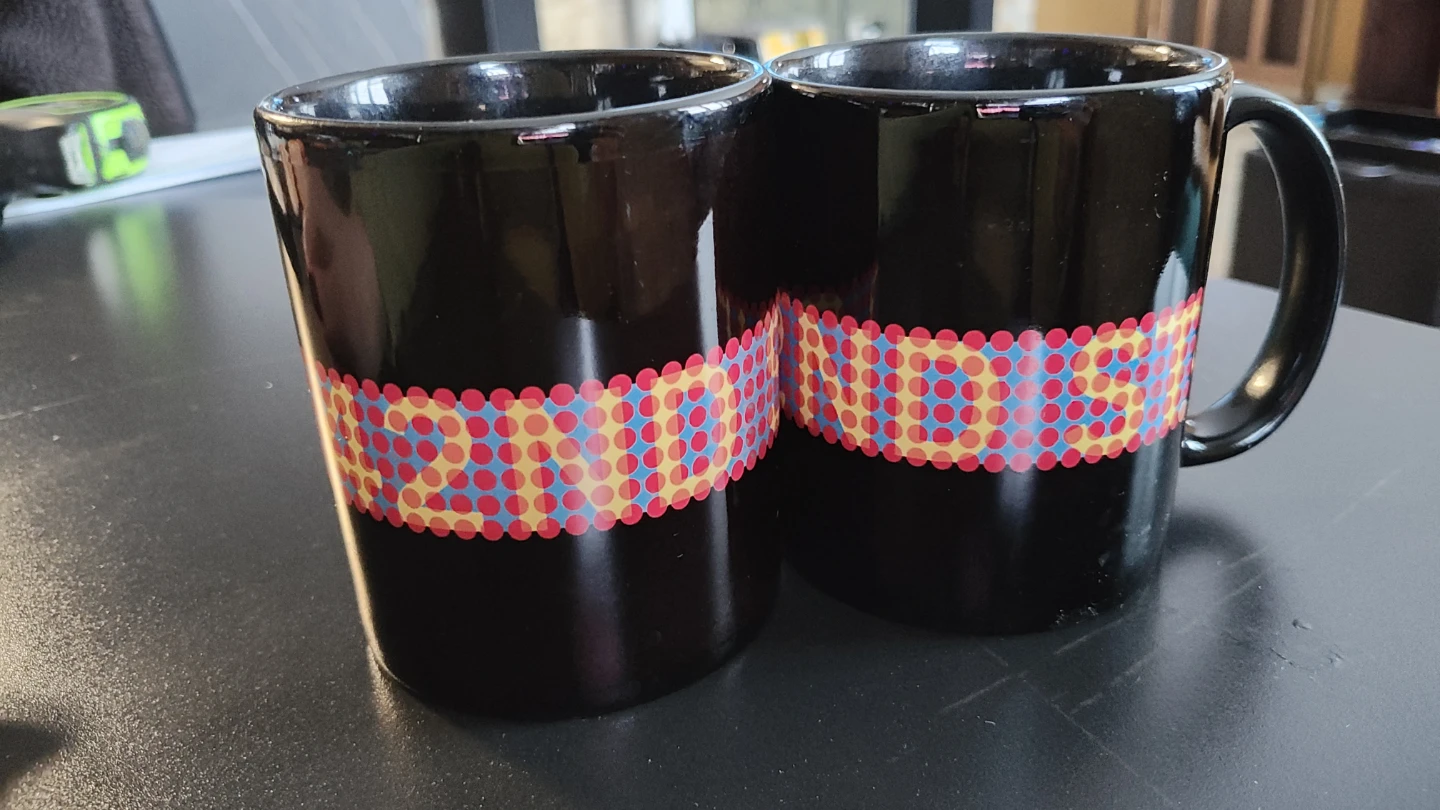 Set of 2 Black Mugs with Colorful Design