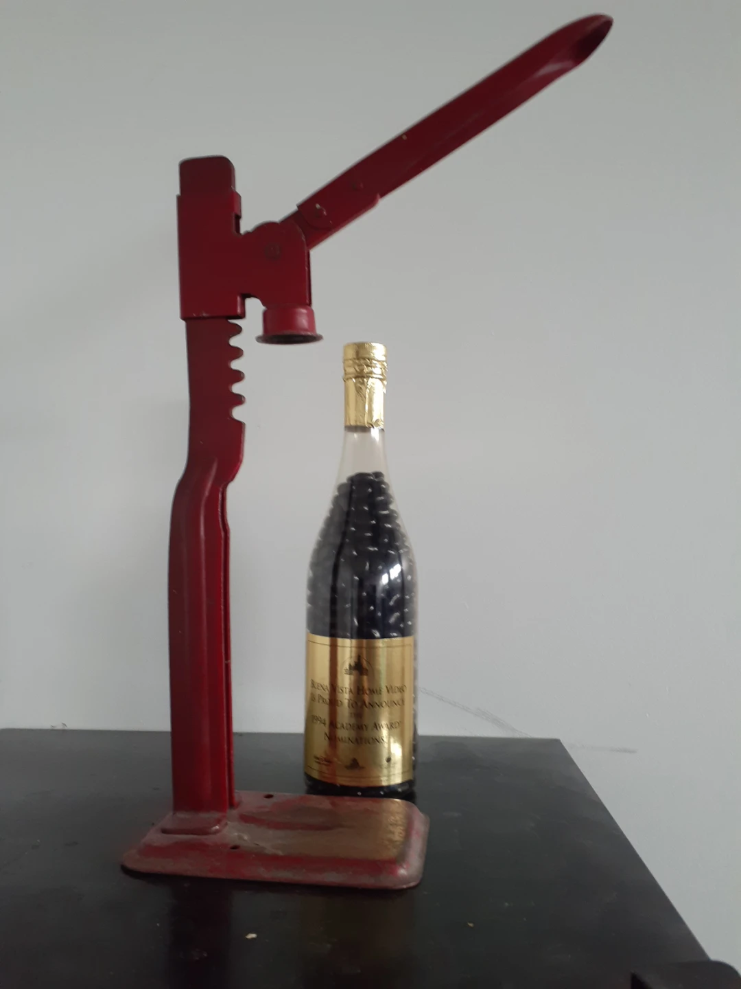 Red Metal Bottle Capper Tool