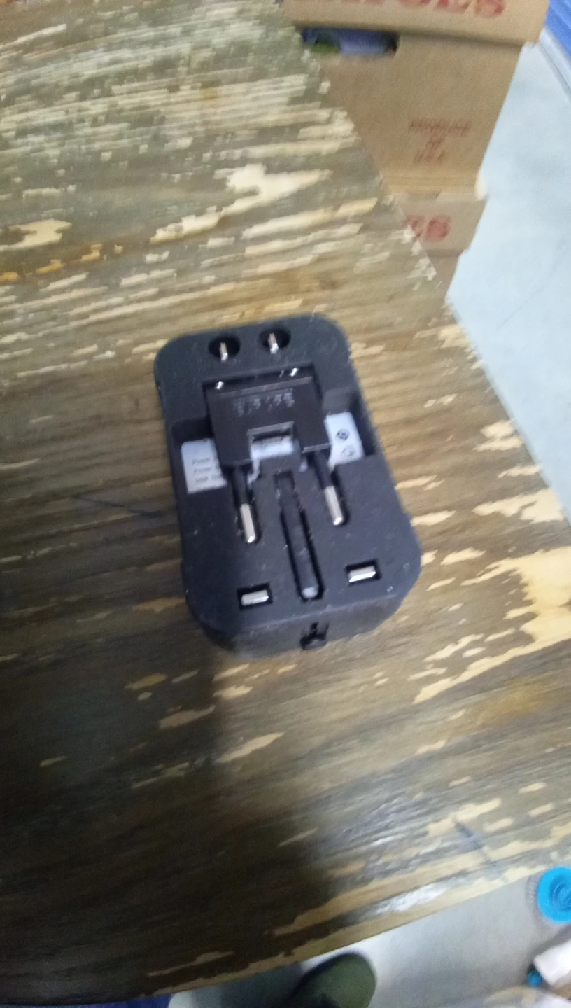 Black Universal Travel Adapter with Surge Protector 🥕 - photo 3