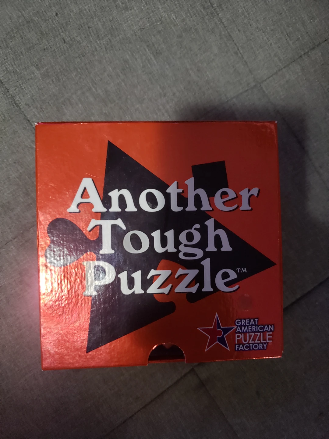 Another Tough Puzzle - Great American Puzzle Factory
