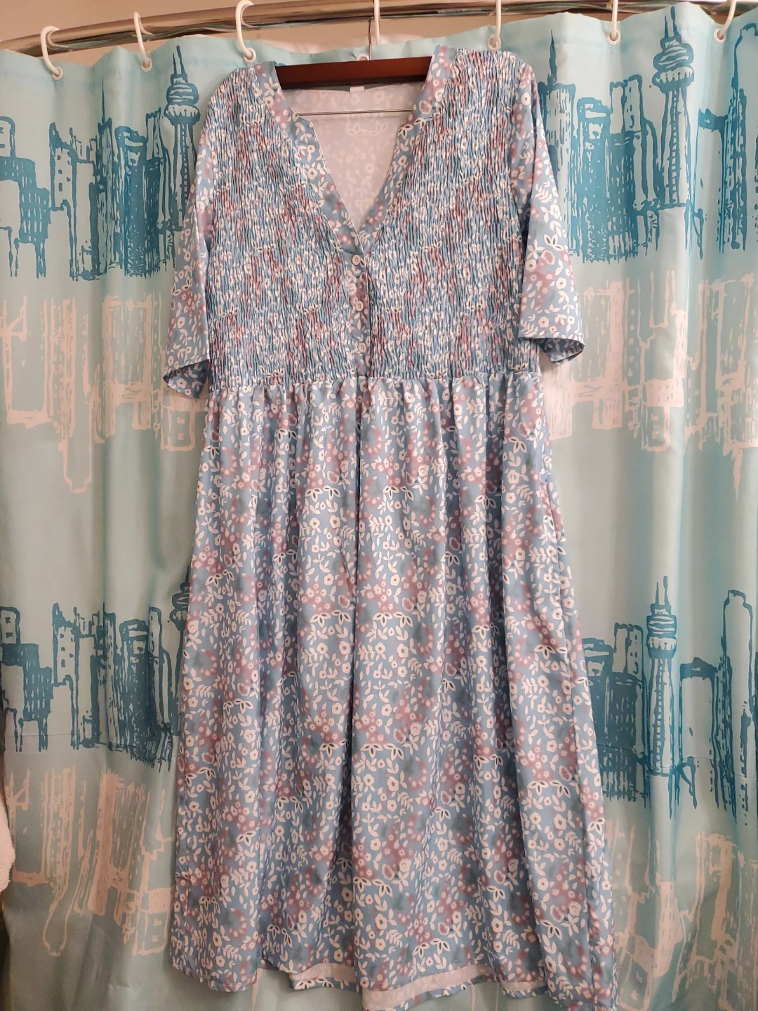 Blue floral midi dress with smocked bodice