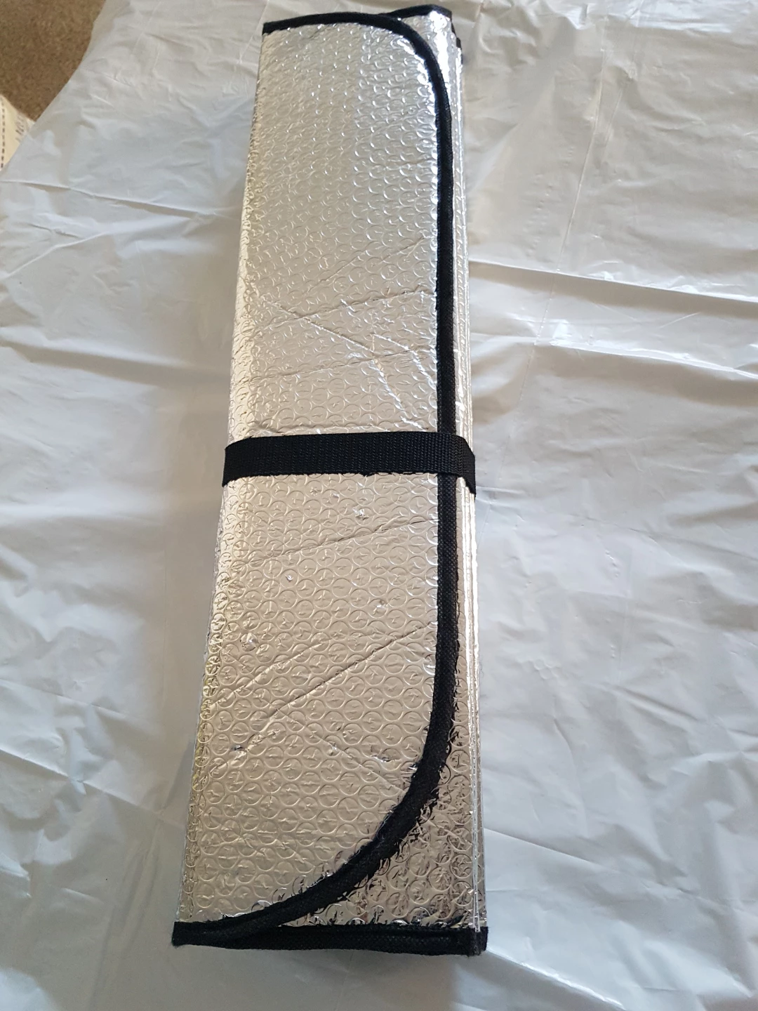 Rolled Up Car Sun Shade