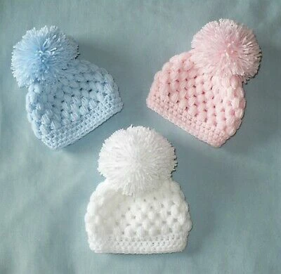 Baby hats with oversixe pompoms