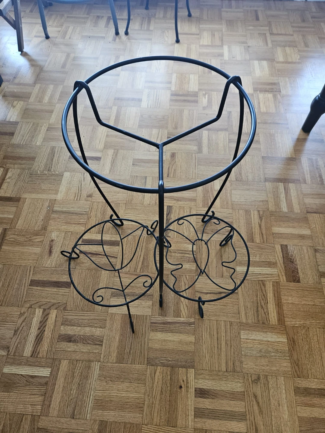 Black Metal Plant Stand with Decorative Accents