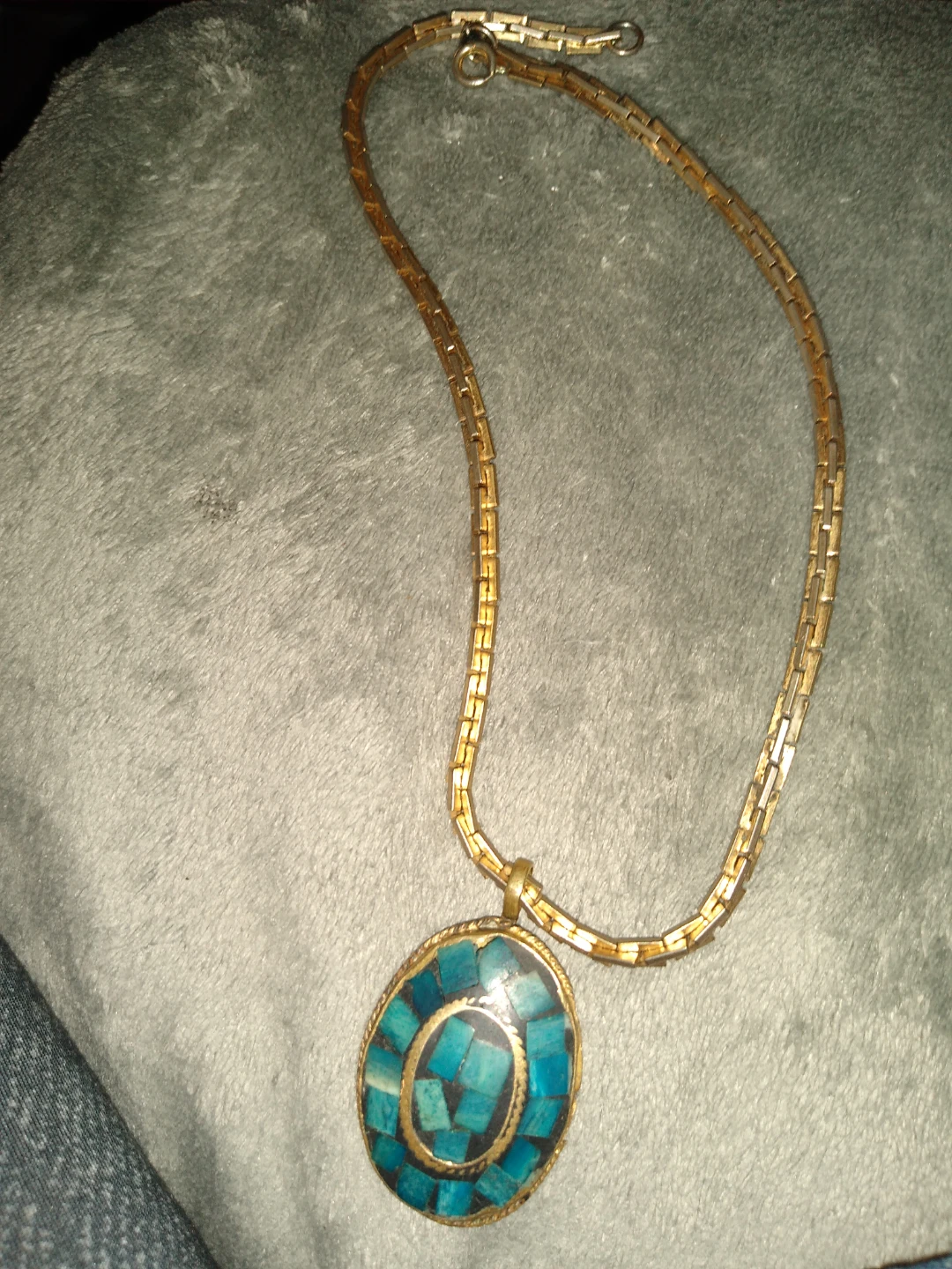 Beautiful gold chain and turquoise pendant