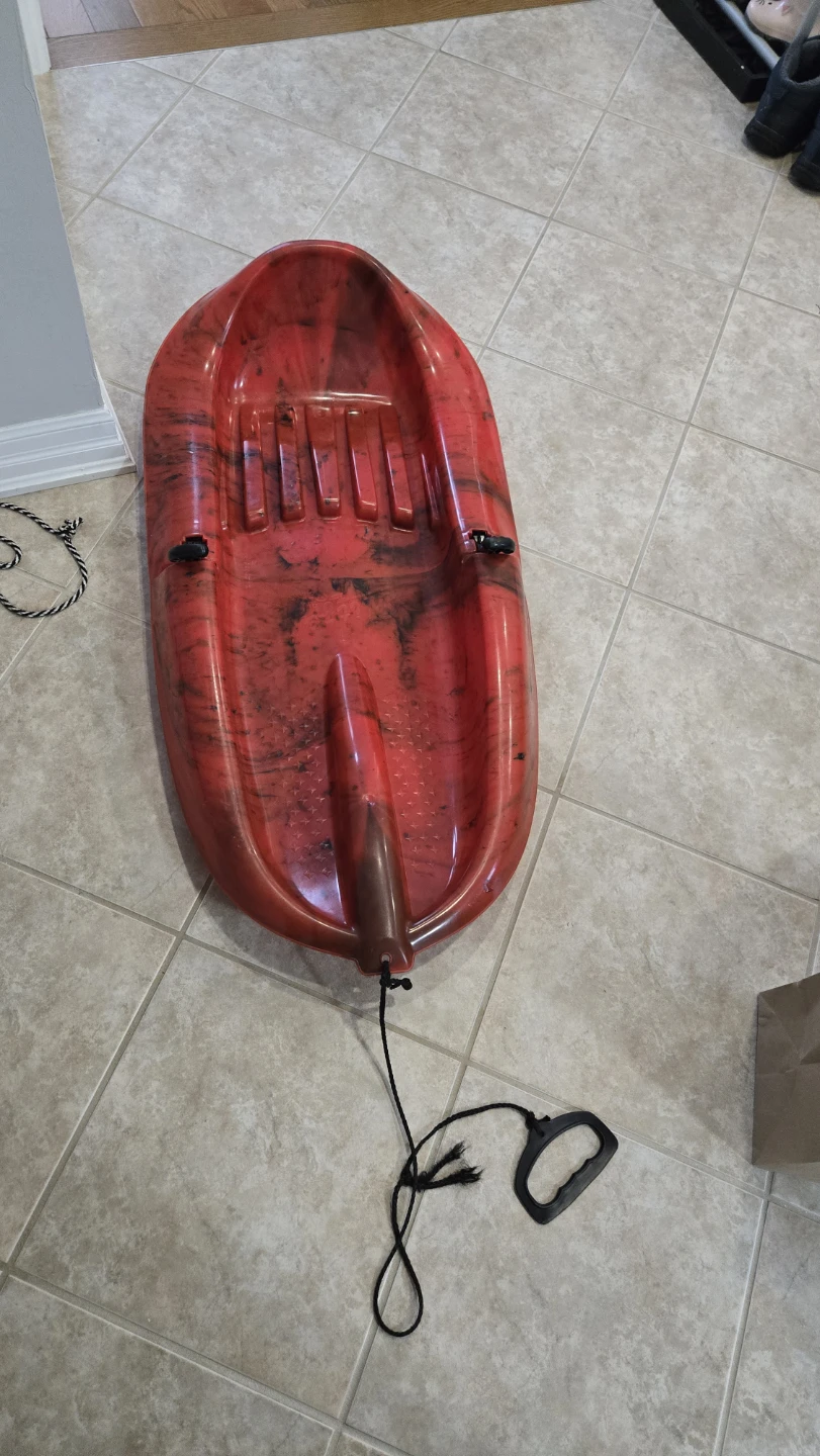 Red Plastic Toboggan Sled with Rope and Handled