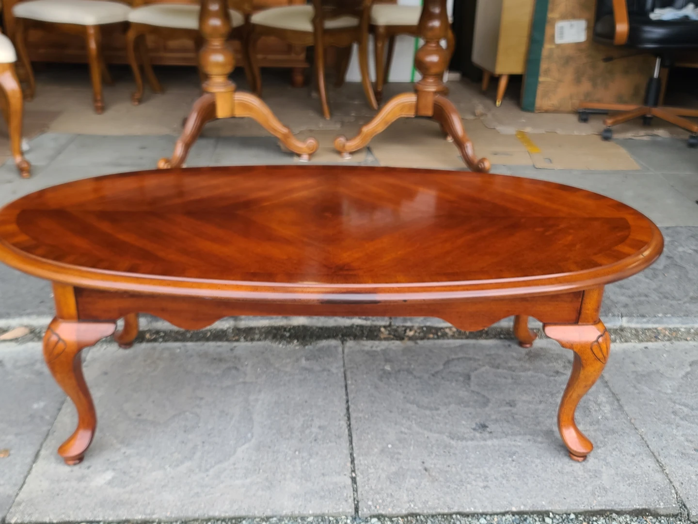 Oval Wood Coffee Table With Carved Legs