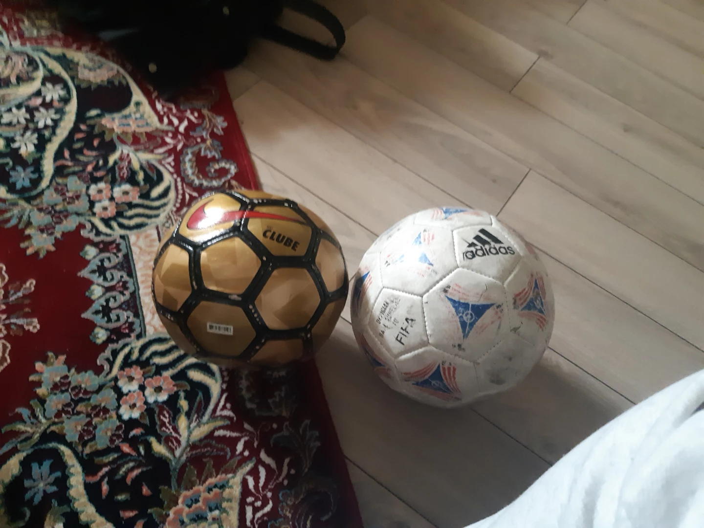 Soccer balls and a small American football. - photo 2