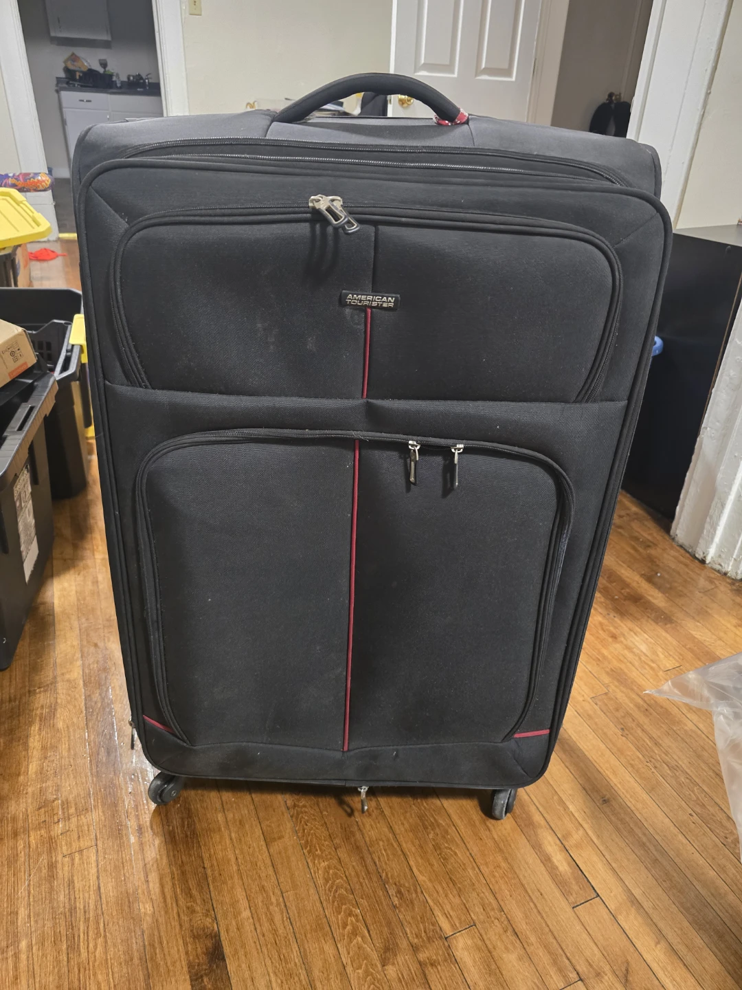 American Tourister Rolling Suitcase