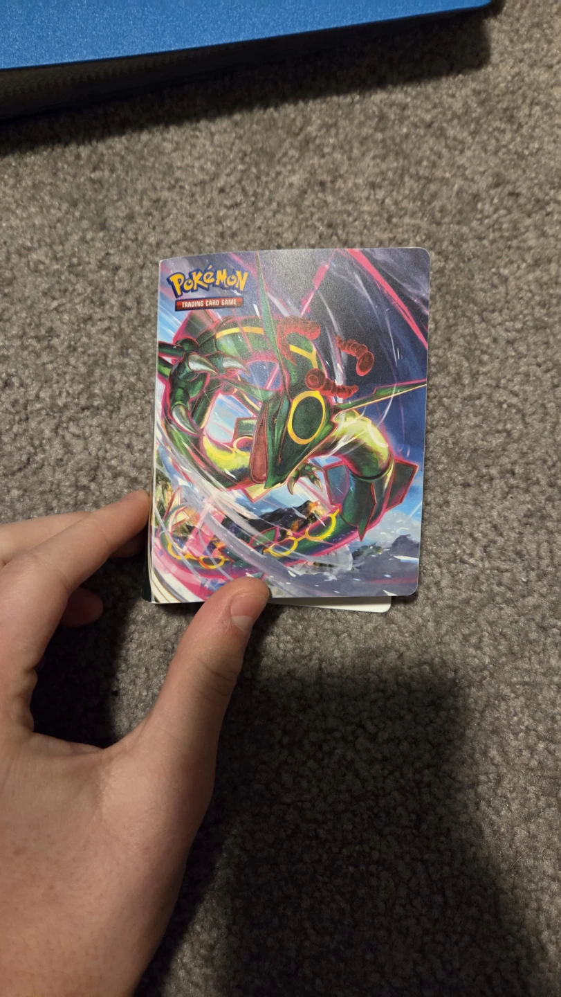 Pokémon binders and boxes full of Pokémon cards.