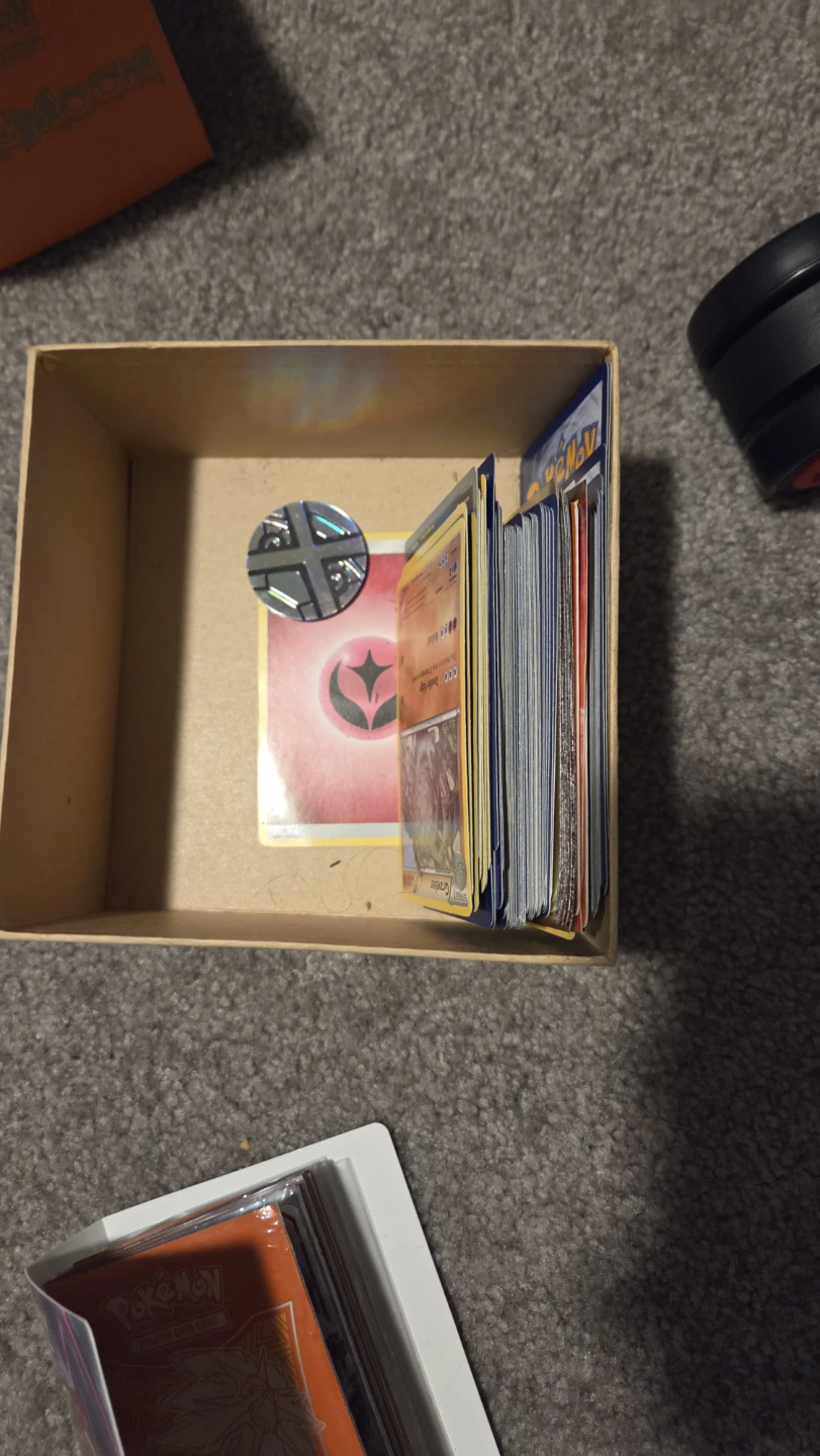 Pokémon binders and boxes full of Pokémon cards. - photo 2