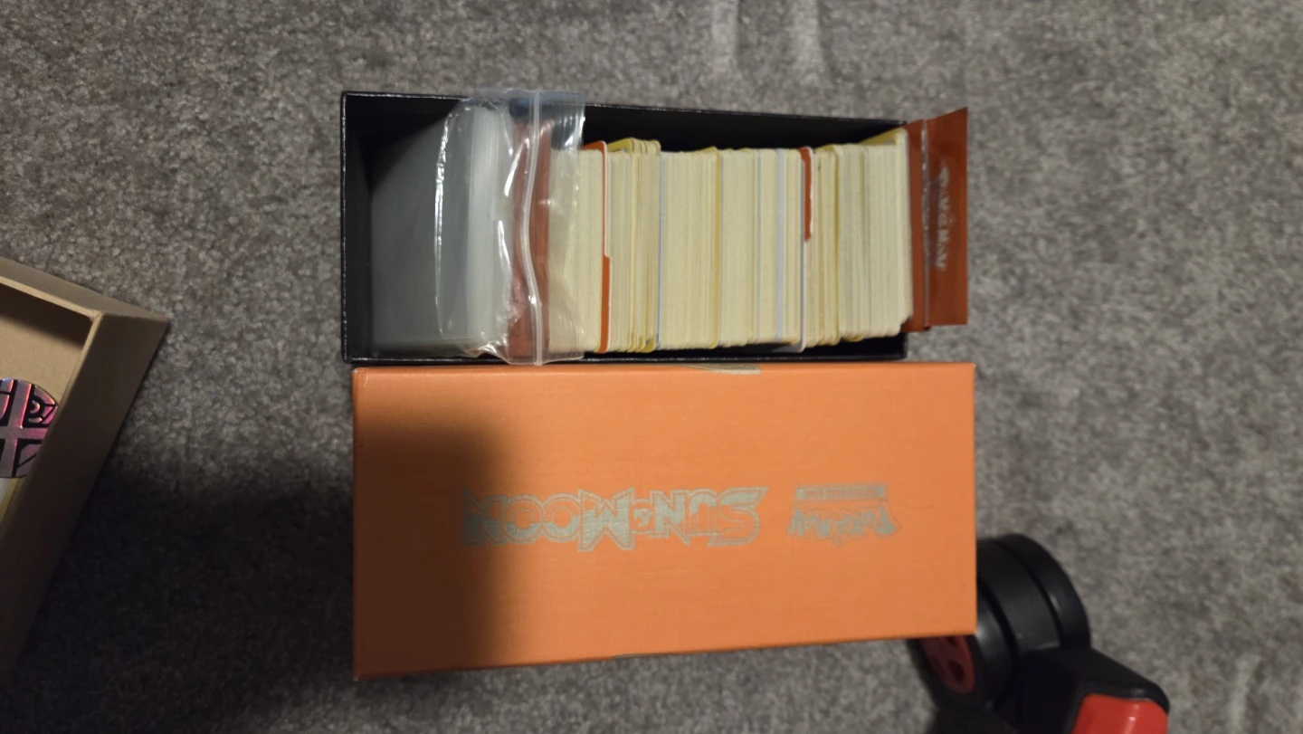 Pokémon binders and boxes full of Pokémon cards. - photo 4