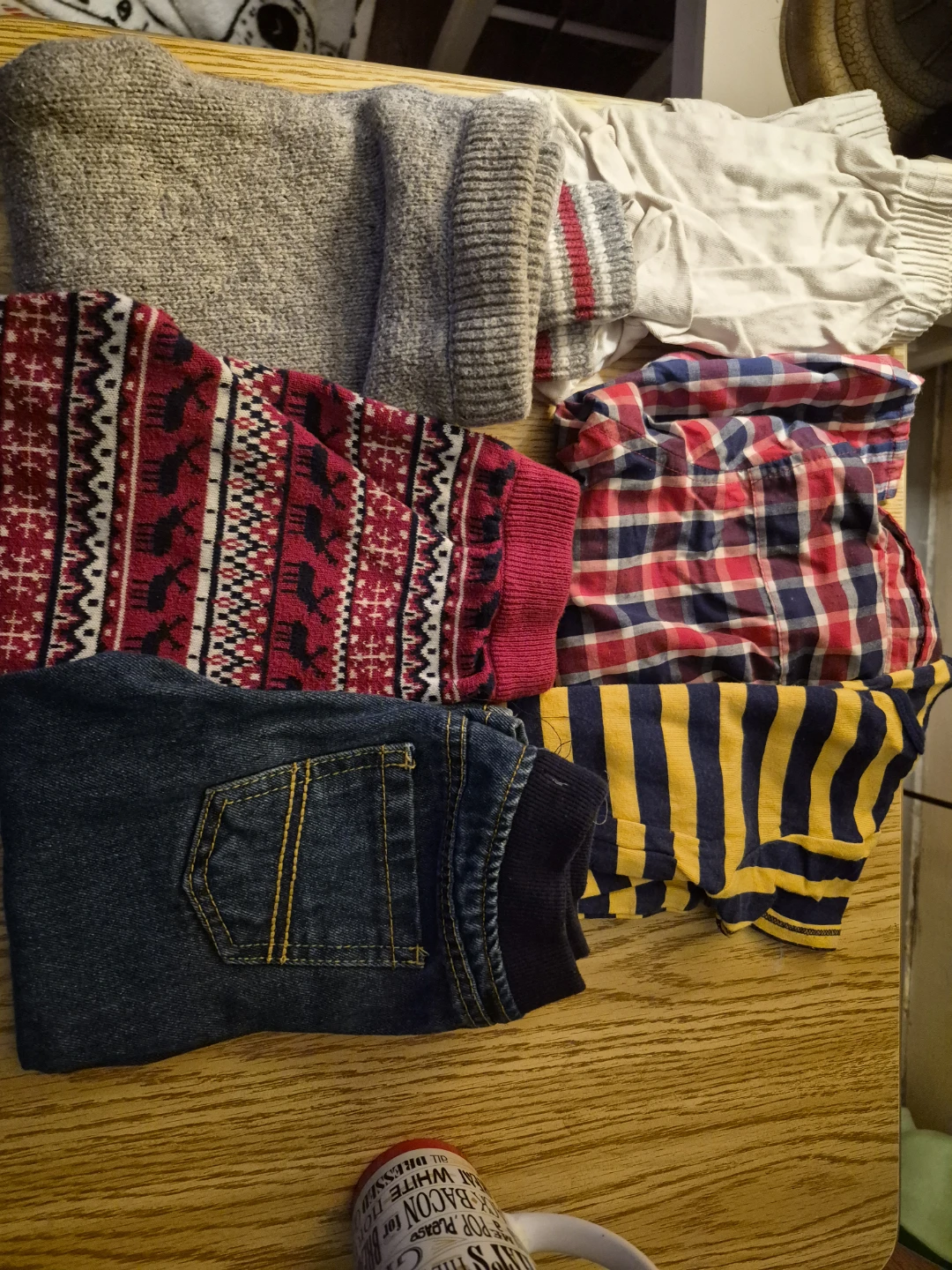 Bundle of kids' clothes: sweater, jeans, shirts