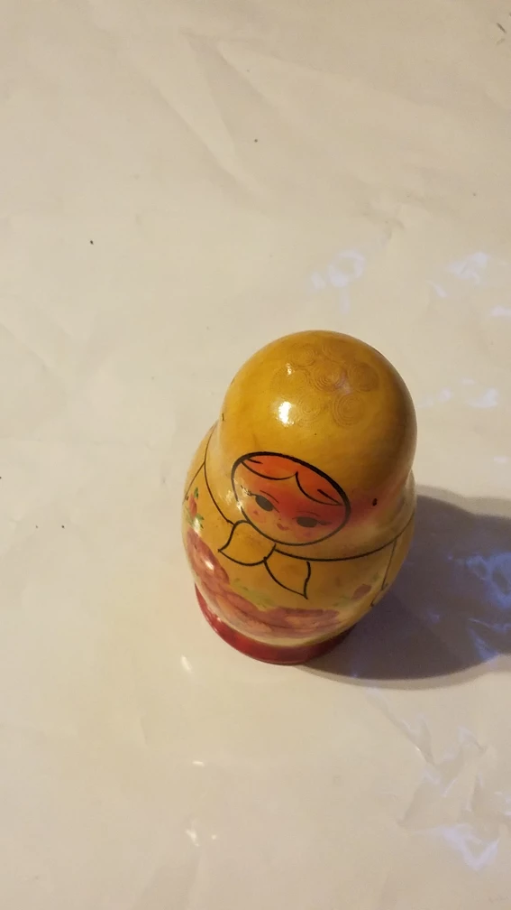 Set of 7 Hand-Painted Wooden Nesting Dolls