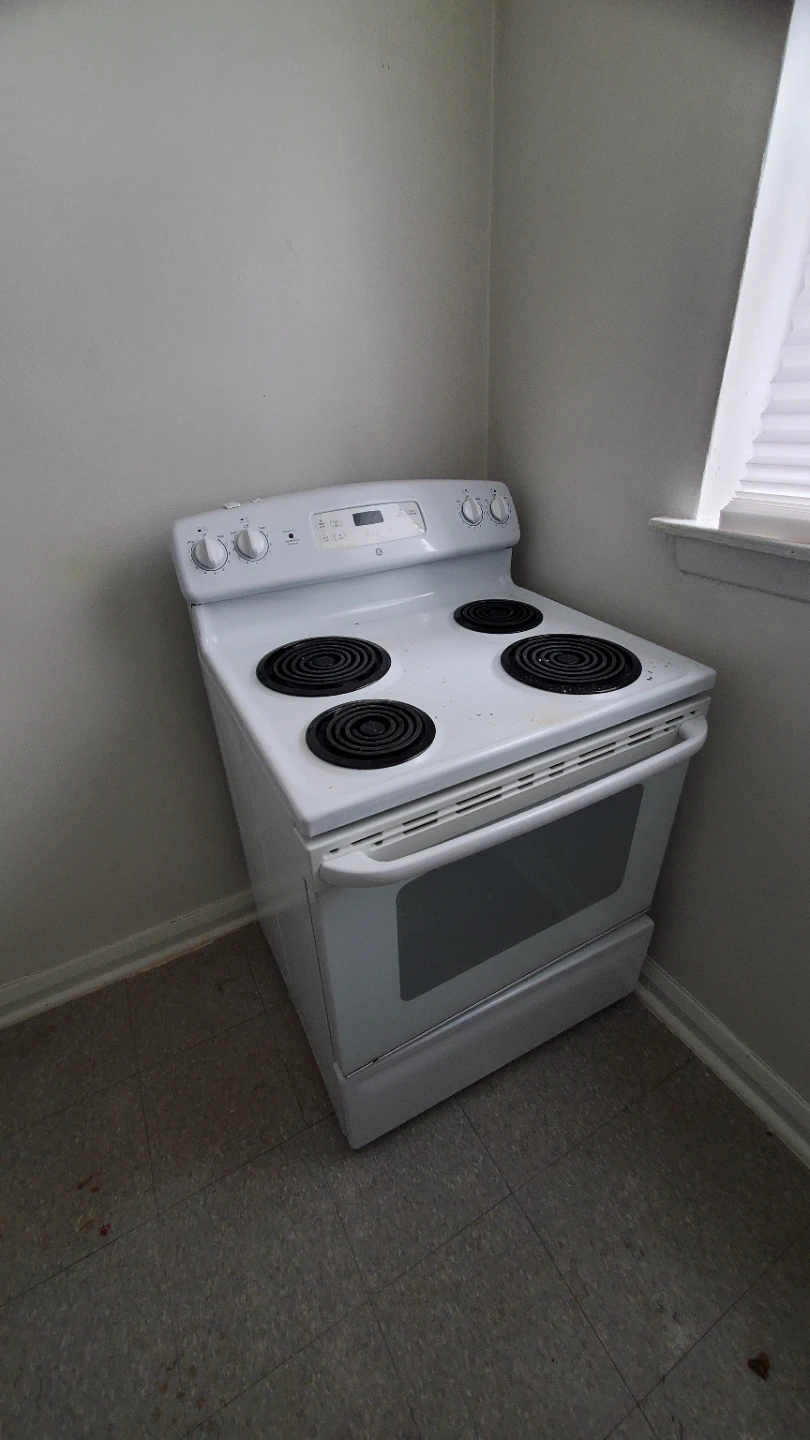 White GE Electric Coil Top Stove with Oven