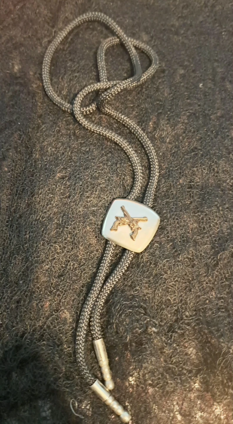Western Style Bolo Tie with Crossed Guns Design