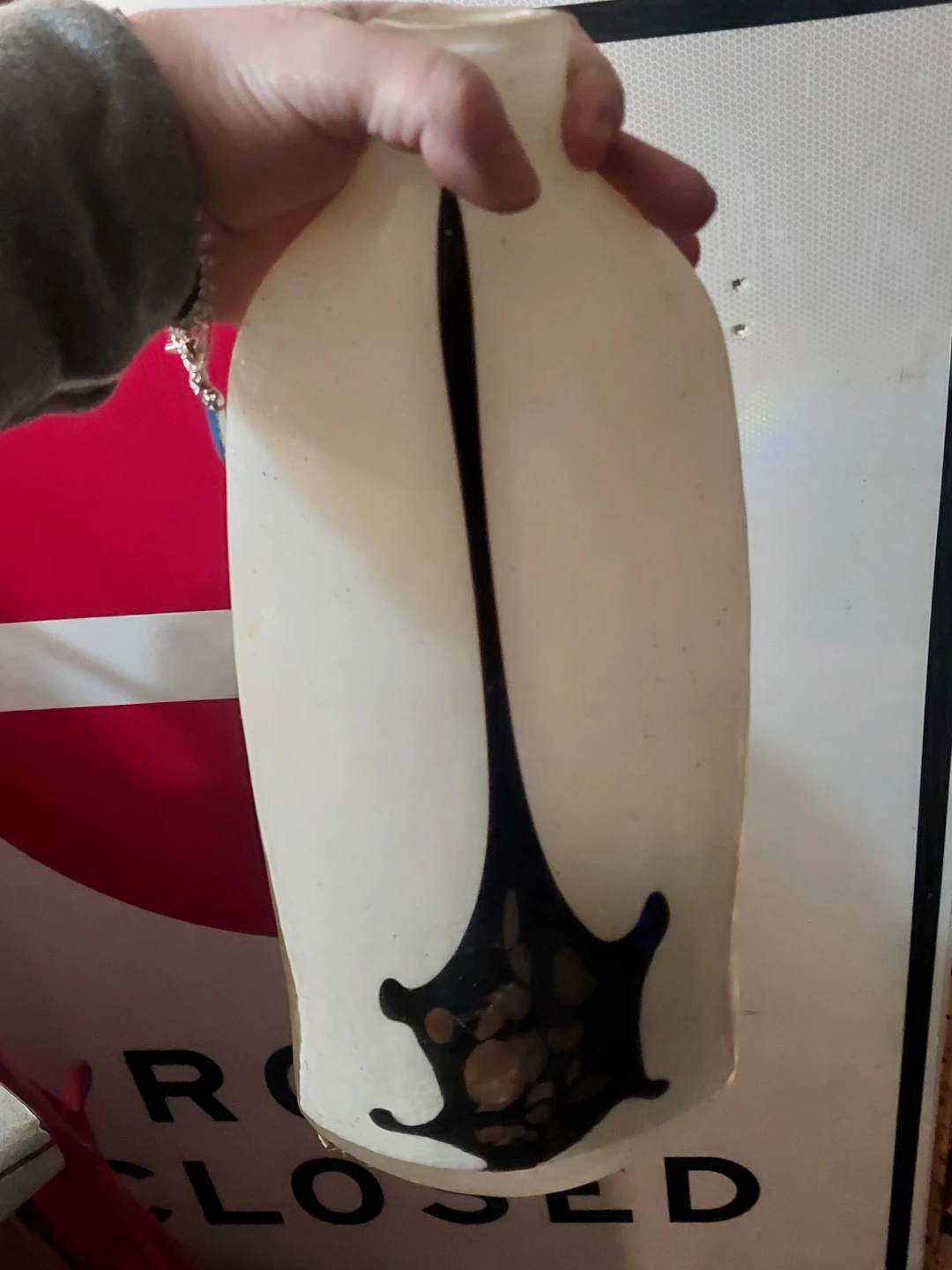 White Vase with Black and Amber Swirl Detail