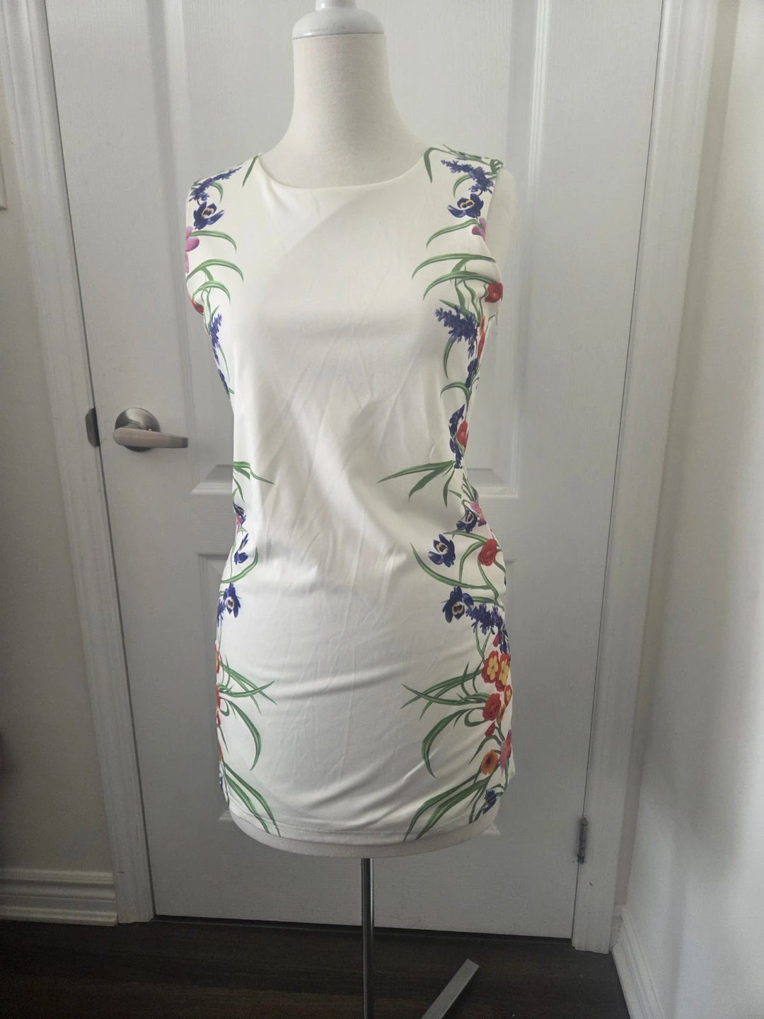White sleeveless dress with floral print