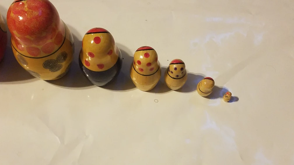 Set of 7 Hand-Painted Wooden Nesting Dolls - photo 2