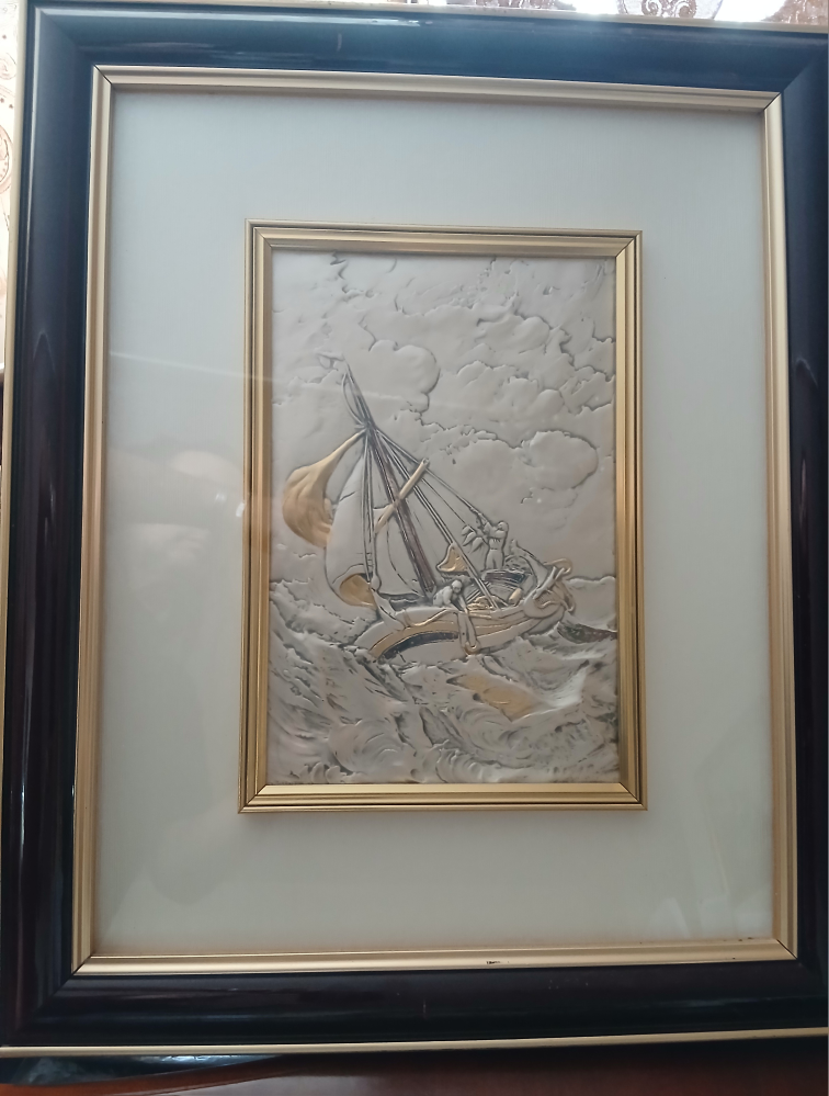 Silver art in frame