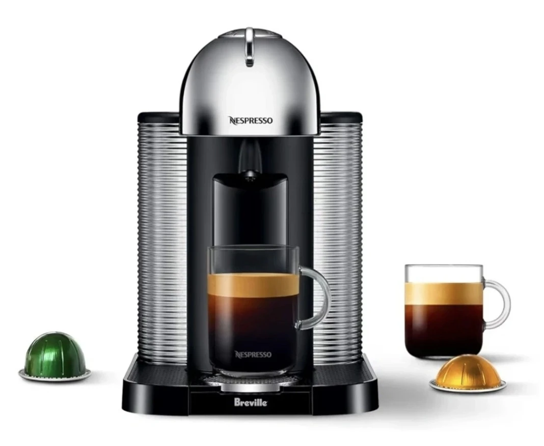Almost New  Nespresso Vertuo Coffee Machine with new pack