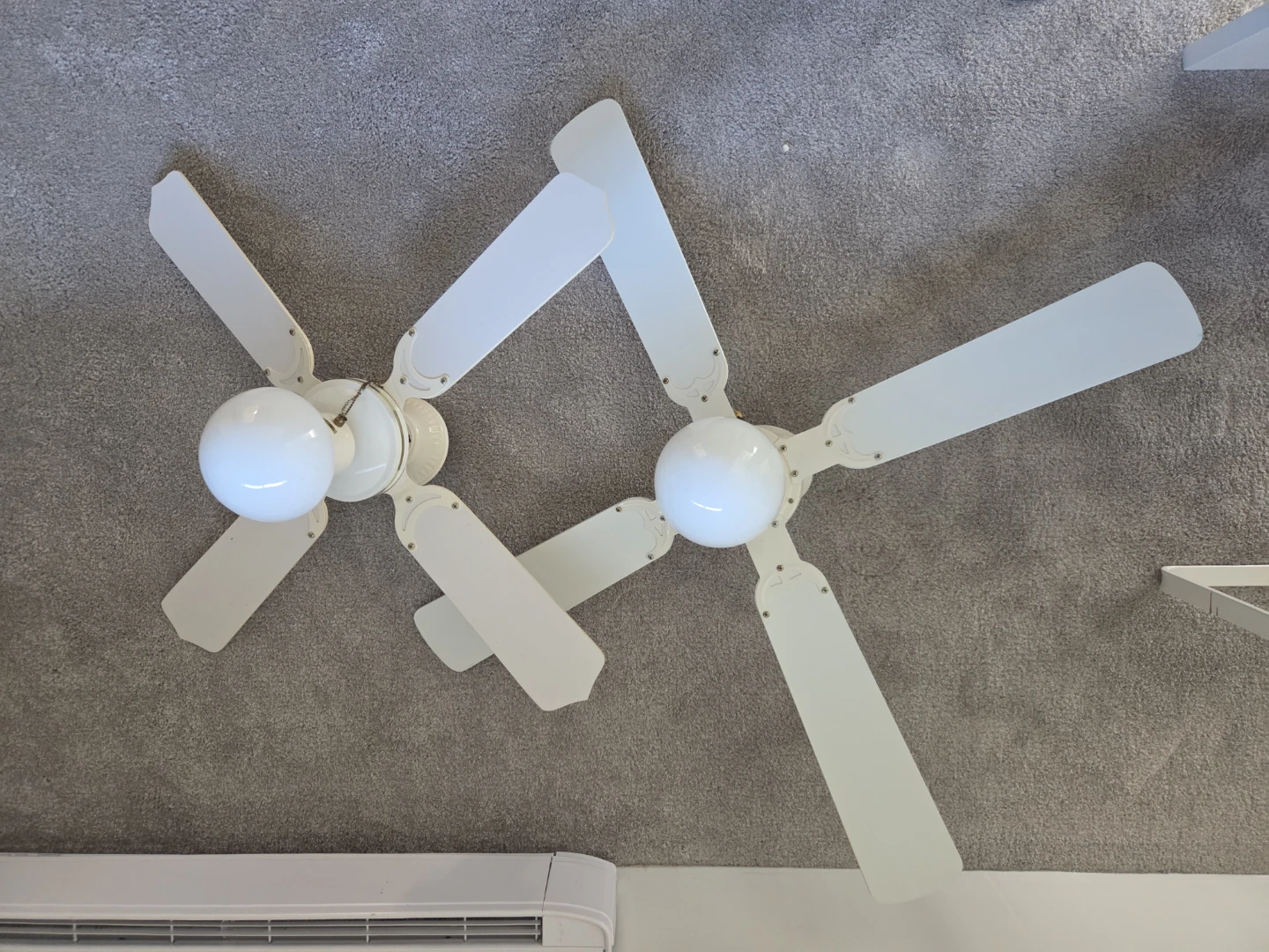 Two White Ceiling Fans with Lights