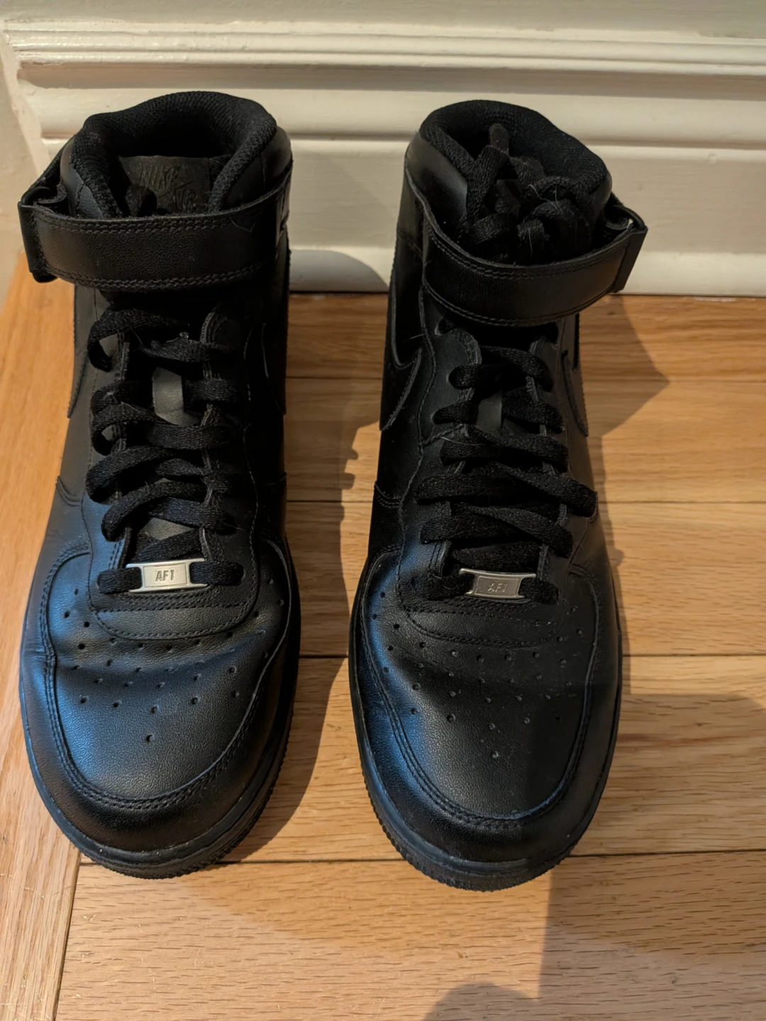 Nike Air Force 1 Mid Black Leather Sneakers