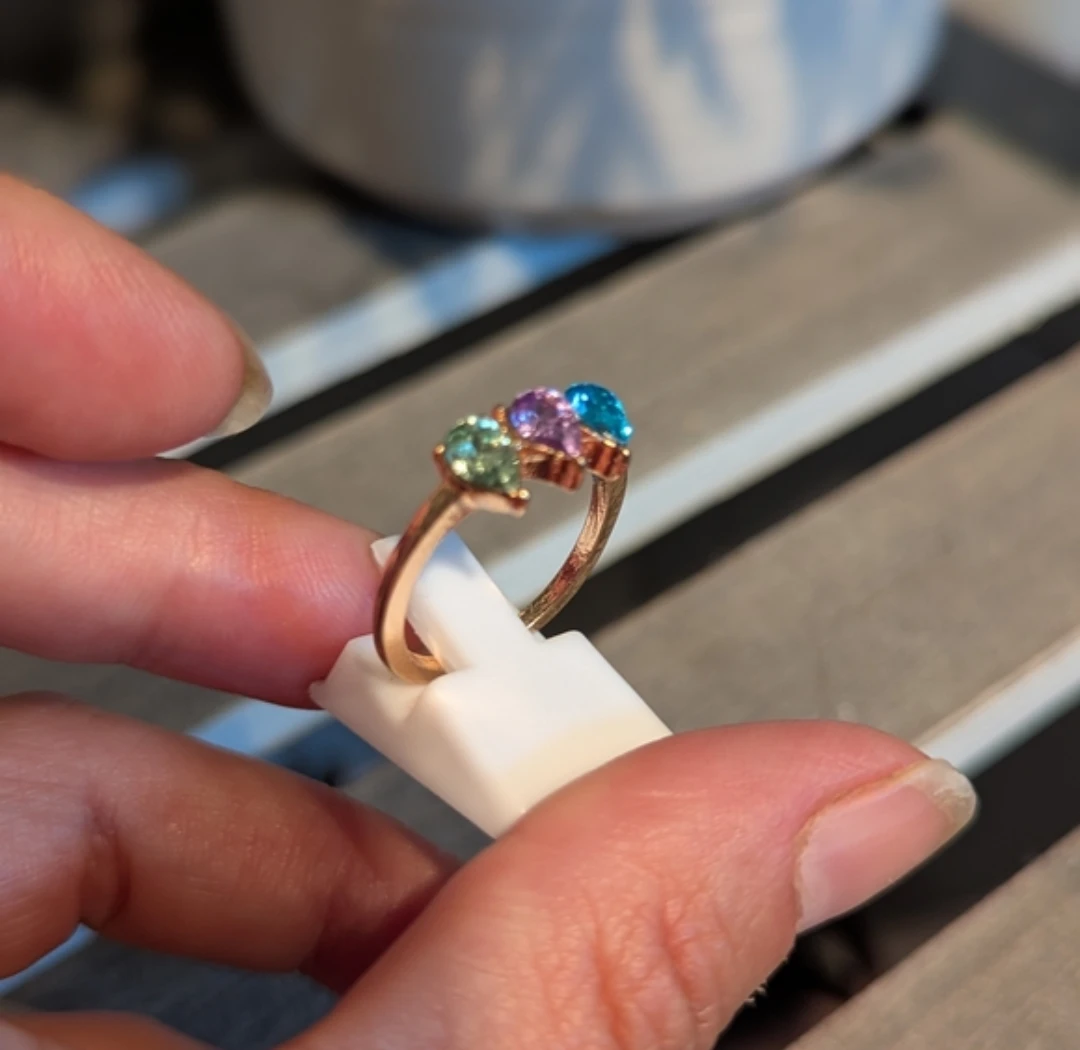 Rose Gold Tone Ring with Three Pear-Cut Gemstones