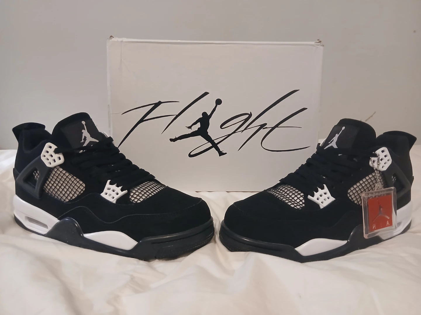 Air Jordan 4 "Flight" Black White Sneakers