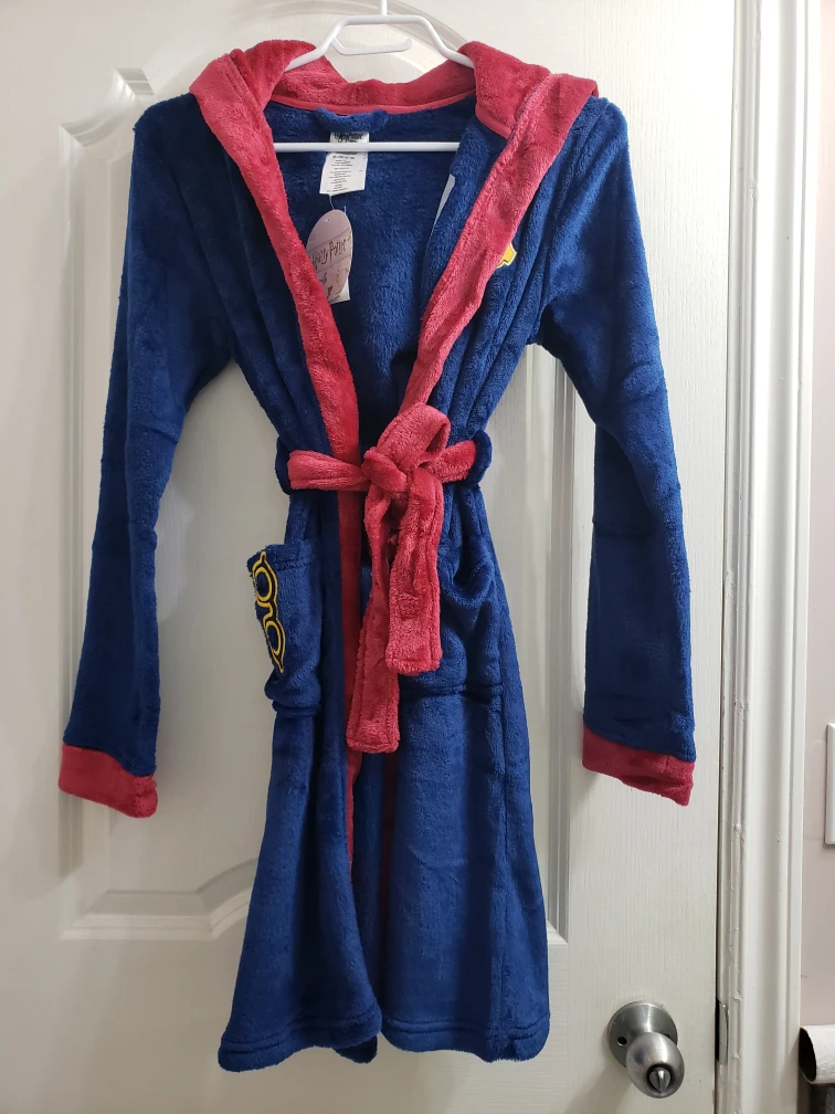 Brand new Harry Potter Fleece Robe.Ages 14-16 years old