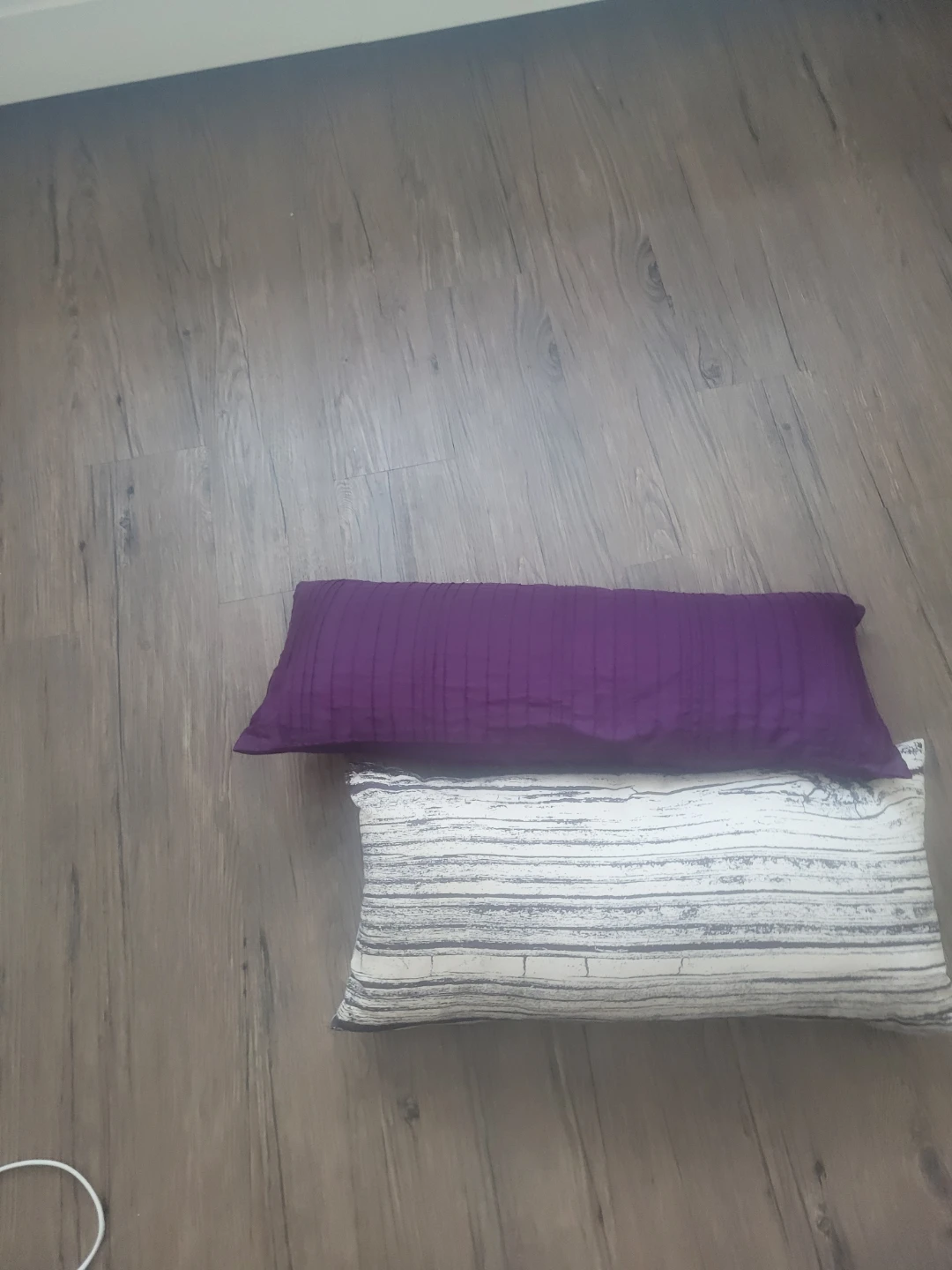 Purple lumbar pillow and decorative cushion