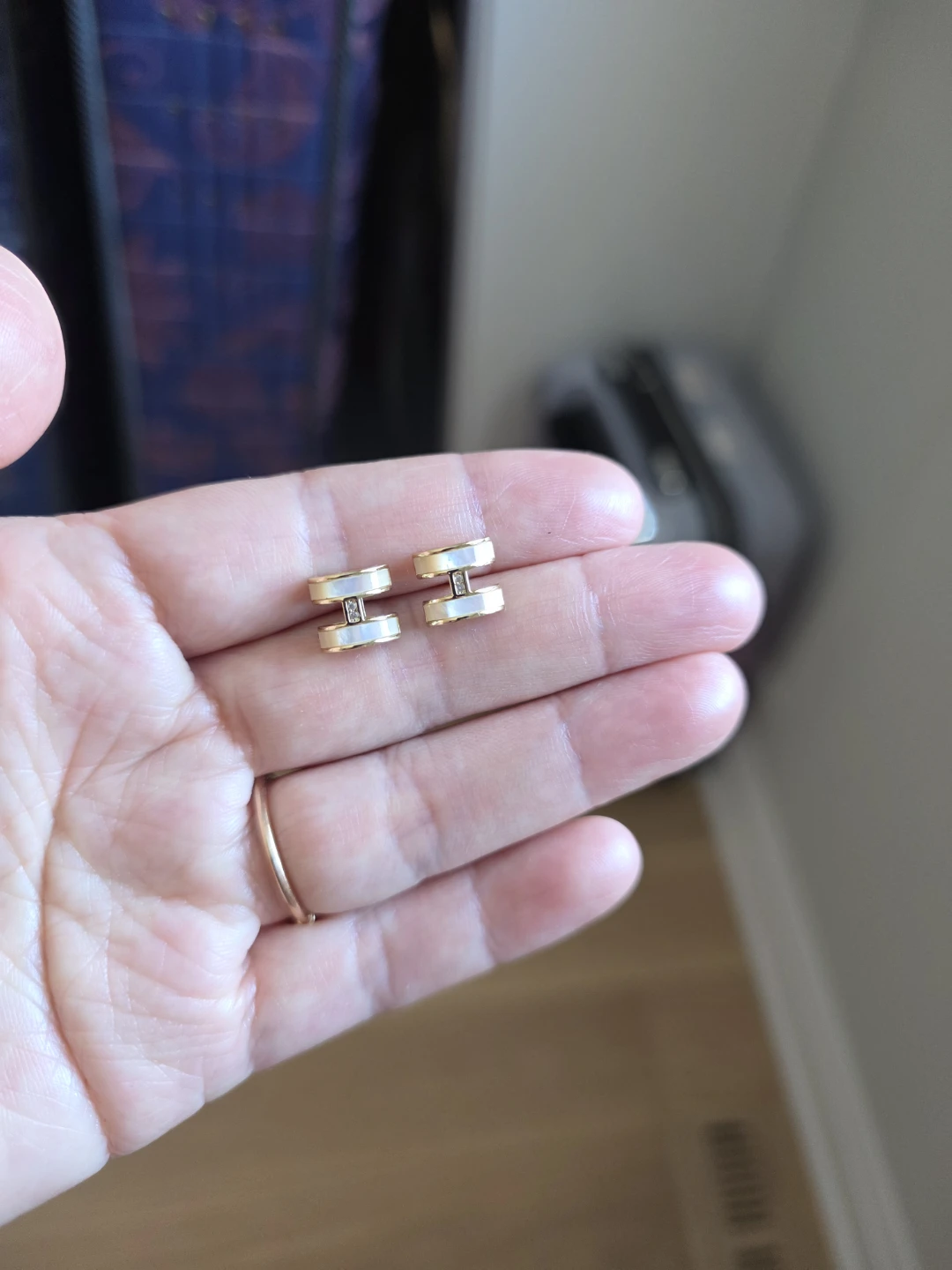 Gold tone H-shaped earrings with small accent stones