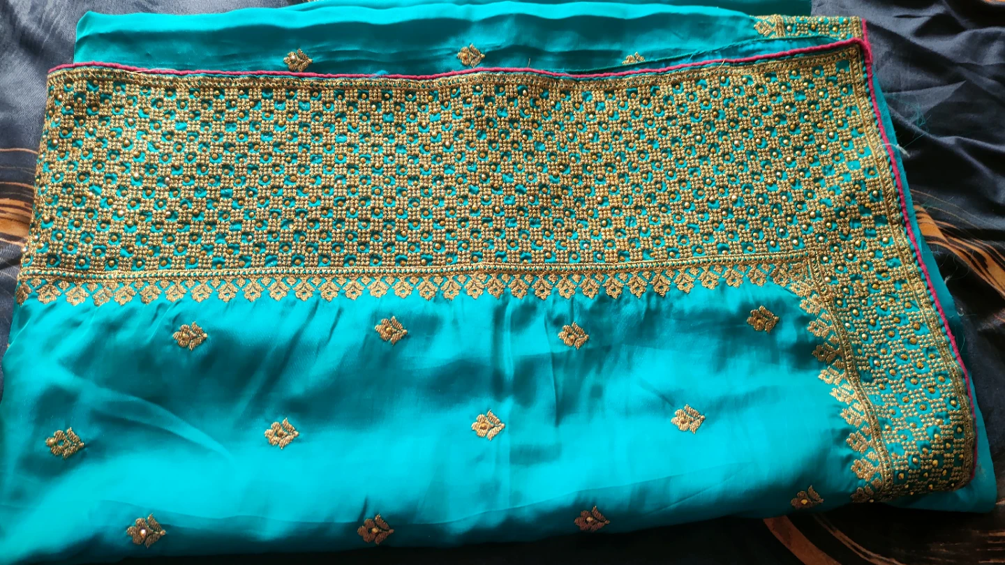Turquoise Saree with Embellished Blouse