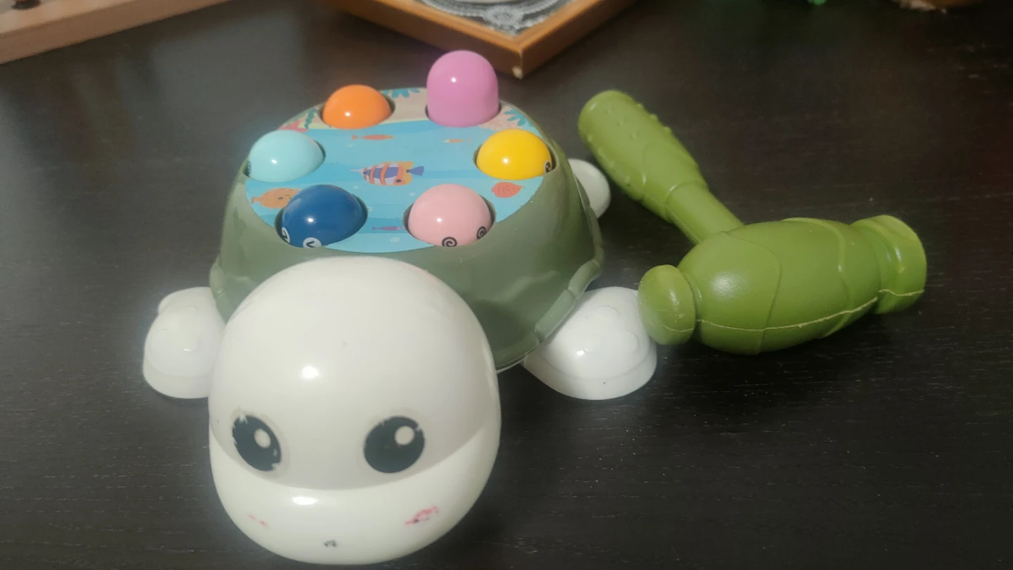 Turtle whack-a-mole toy with hammer