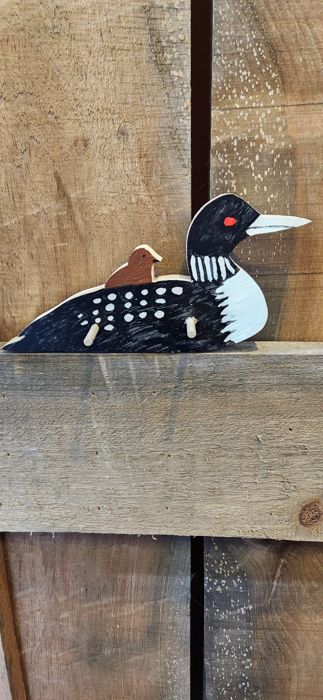Handcrafted Wooden Loon Decoration with Baby