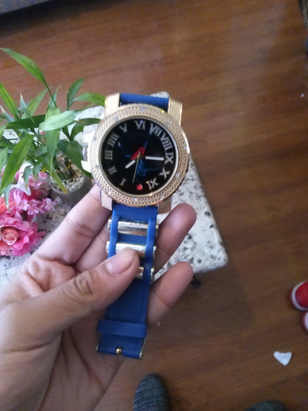 Gold Tone Watch with Blue Silicone Band and Crystal Bezel