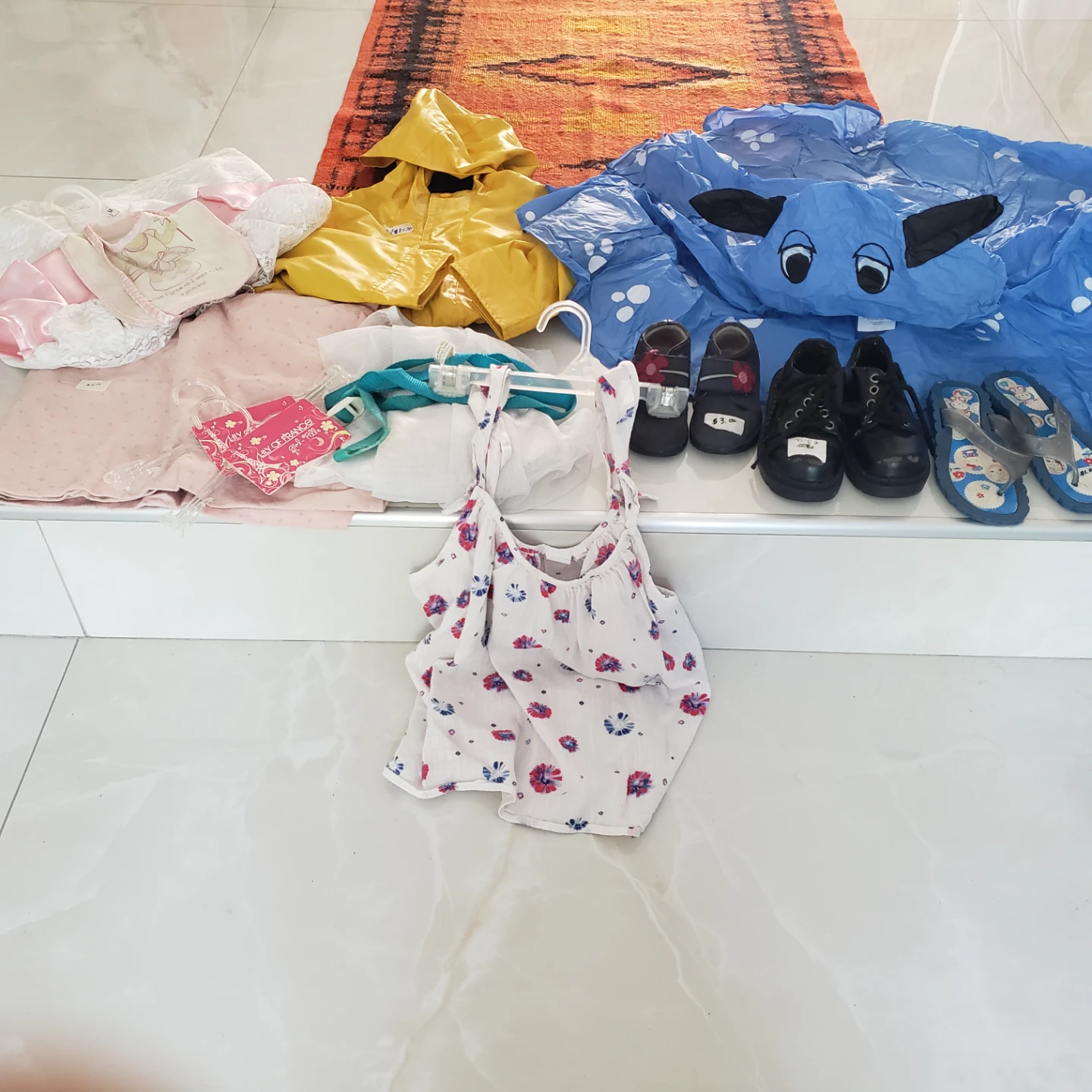 Bundle of Baby Clothes and Shoes