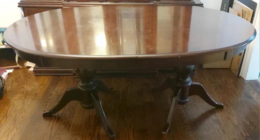 Oval Dining Table with Pedestal Legs