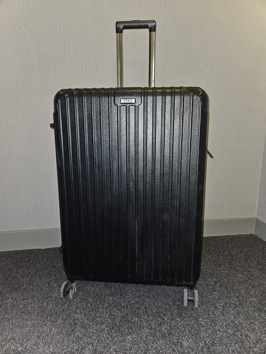 ELLE Black Hardside Expandable Spinner Luggage