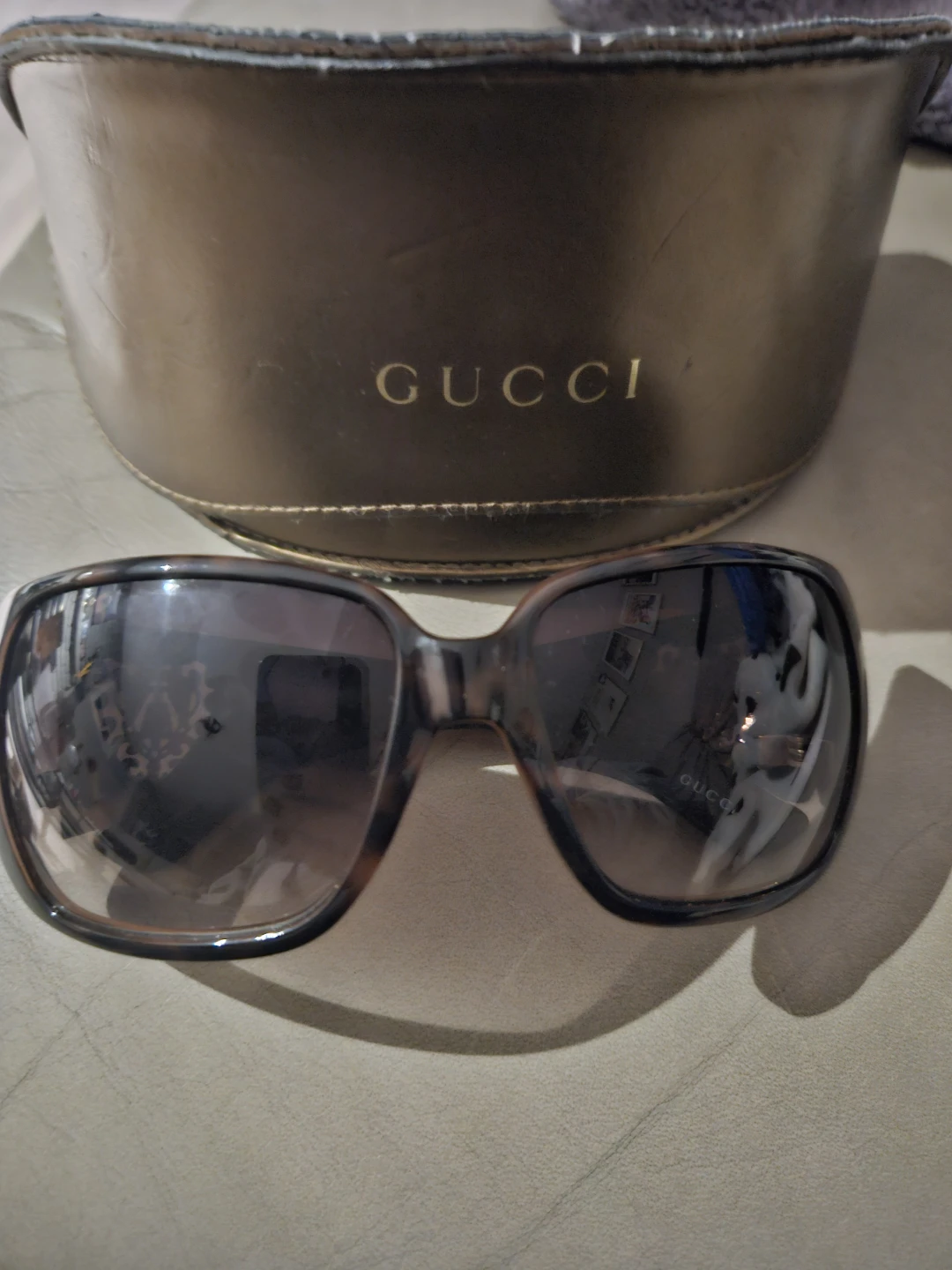 GUCCI Sunglasses with Heart Embellishments