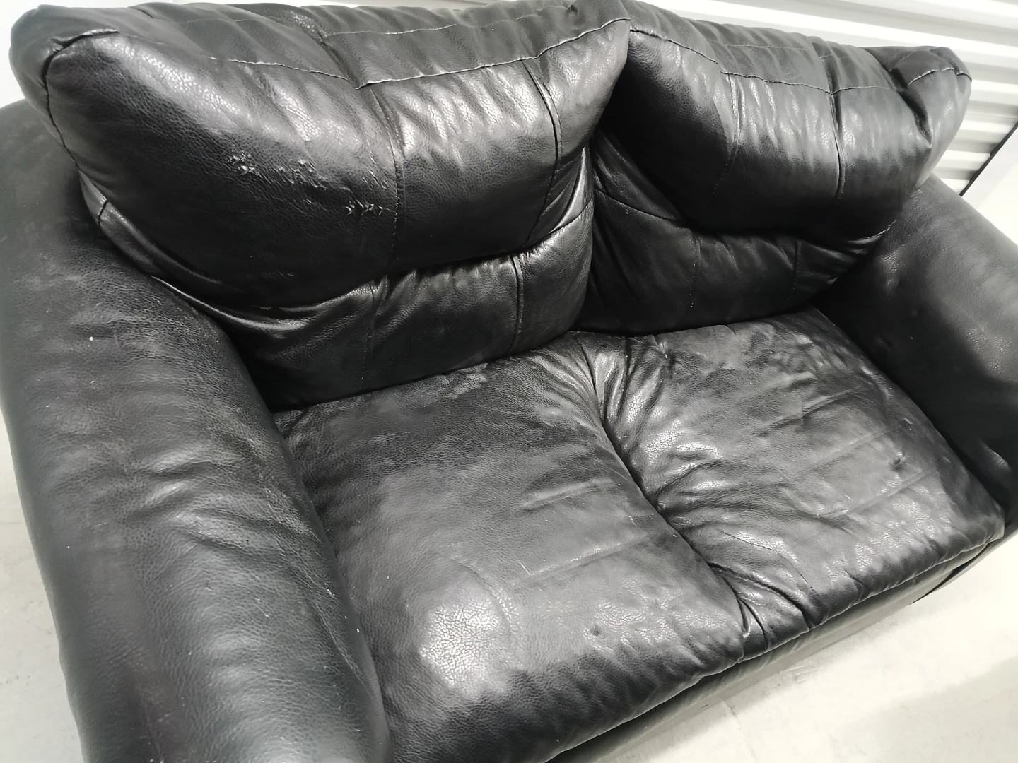 Used Black Leather Loveseat