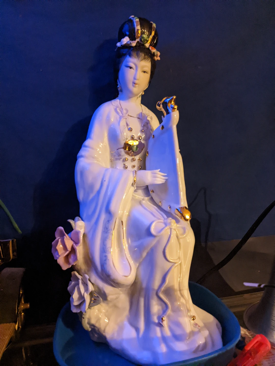 White Porcelain Figurine with Gold Accents