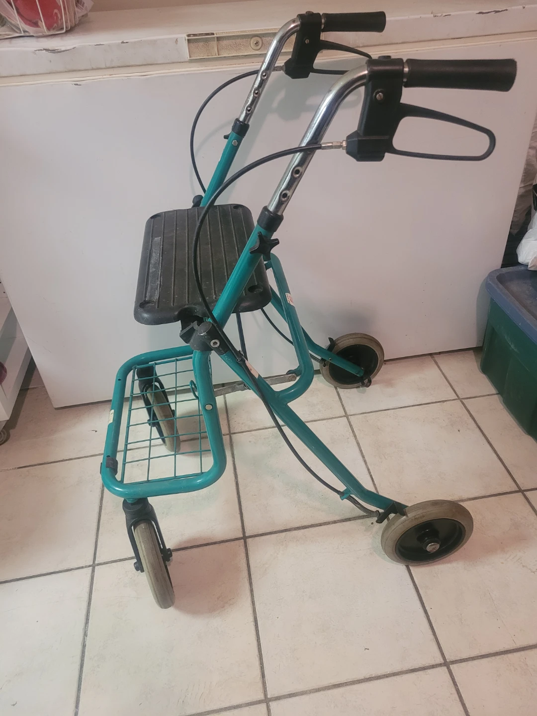 Teal Rolling Walker with Seat and Basket