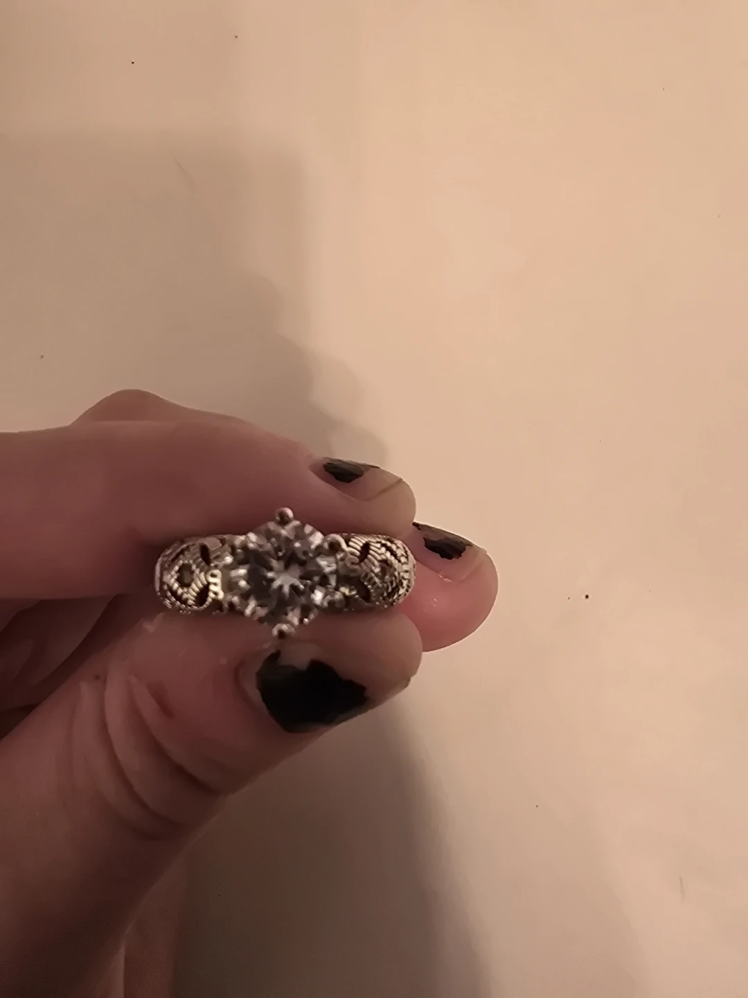 Silver-tone engagement ring with clear stone