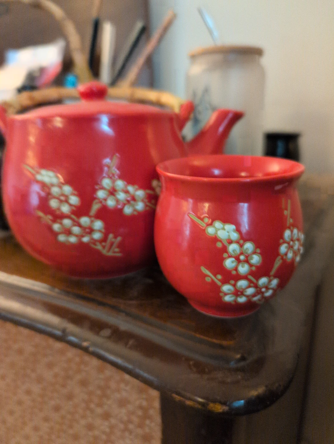 Red Ceramic Teapot with White Floral Design