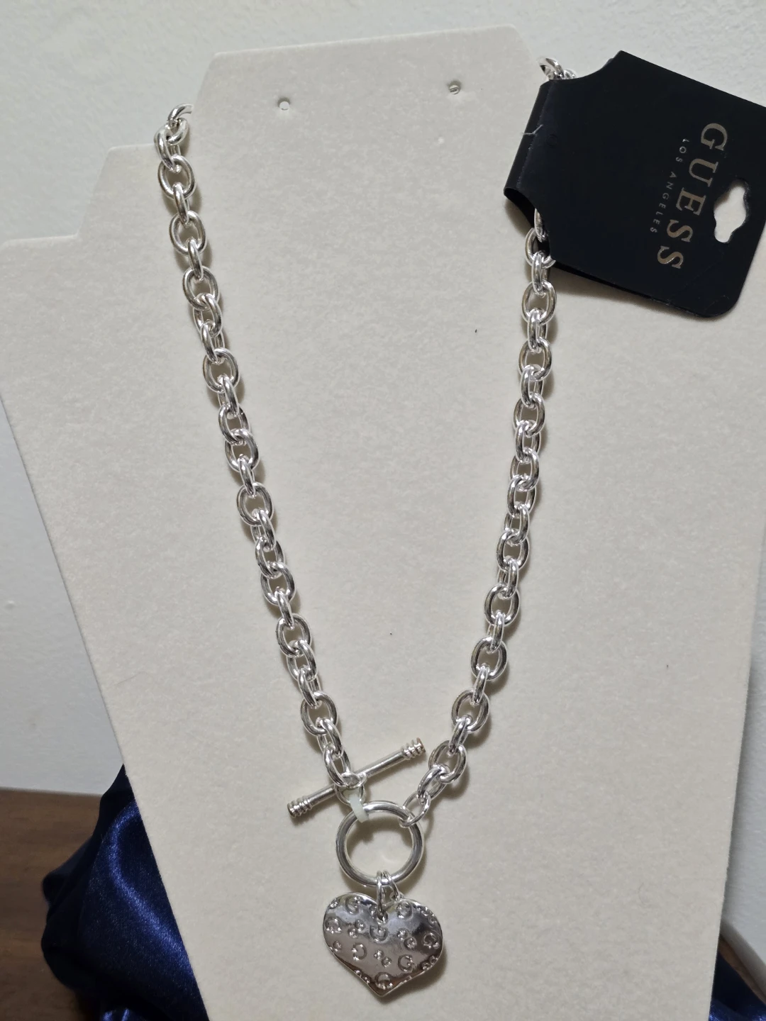 Guess Silver Tone Toggle Necklace with Heart Charm