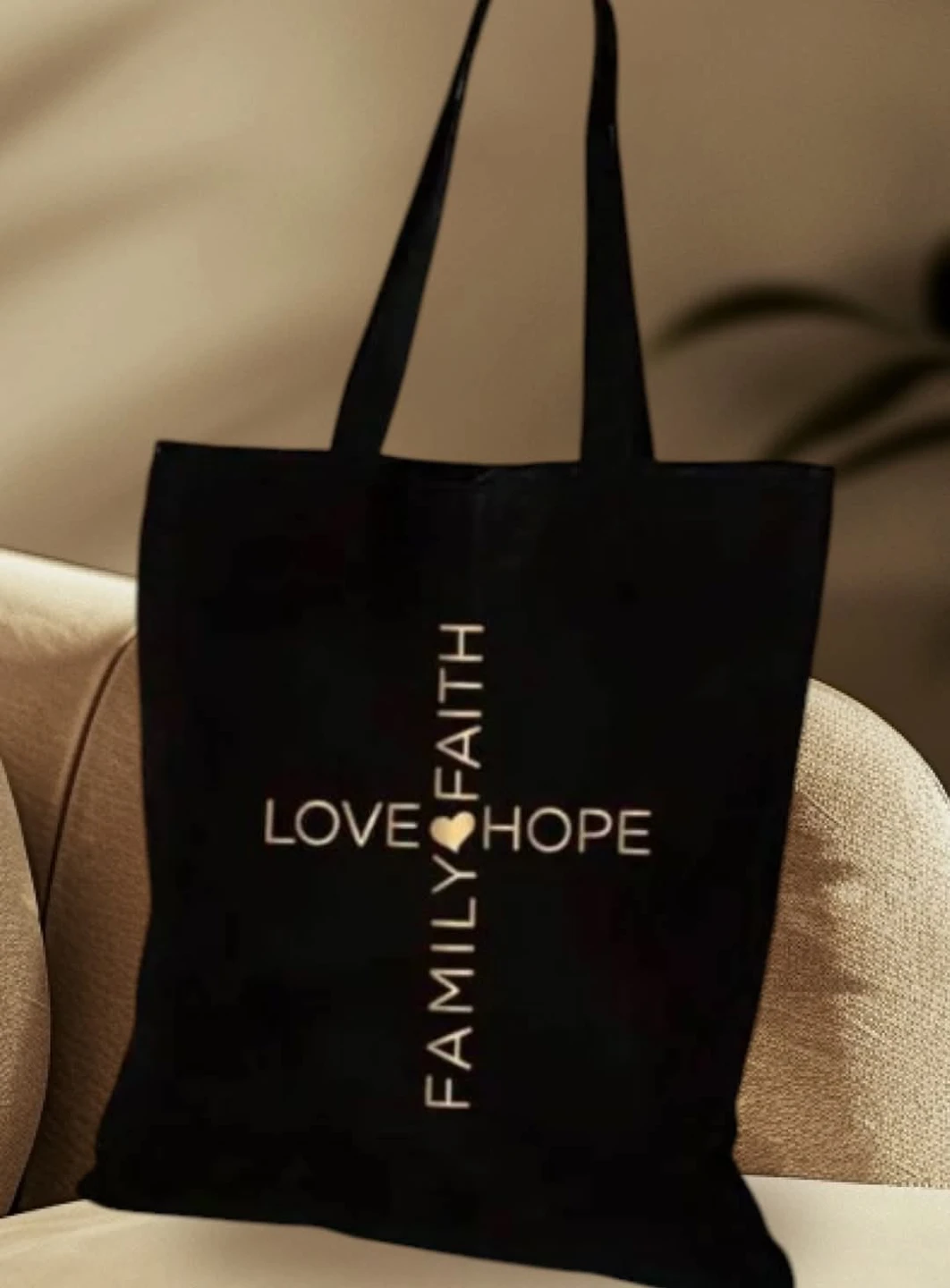Black Tote Bag with "Love, Hope, Family, Faith"