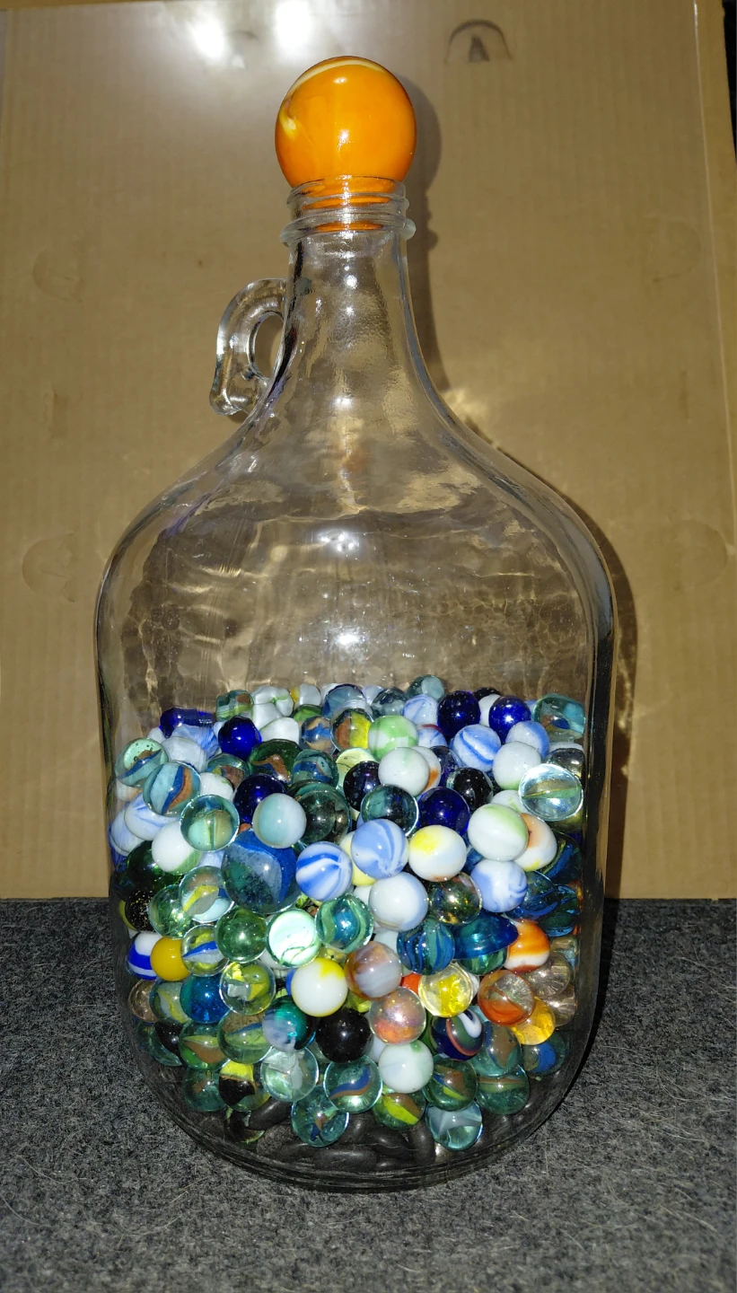 Glass Jug of Assorted Marbles