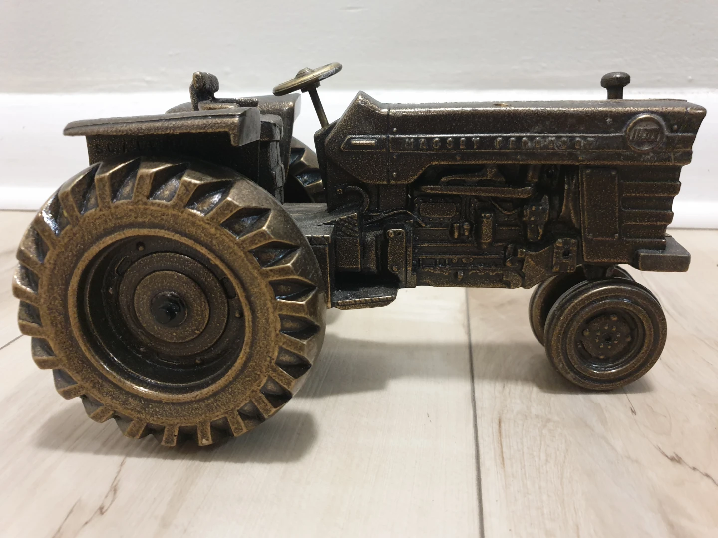 Collectible brass replica of a Massey Ferguson 1100 tractor - photo 2