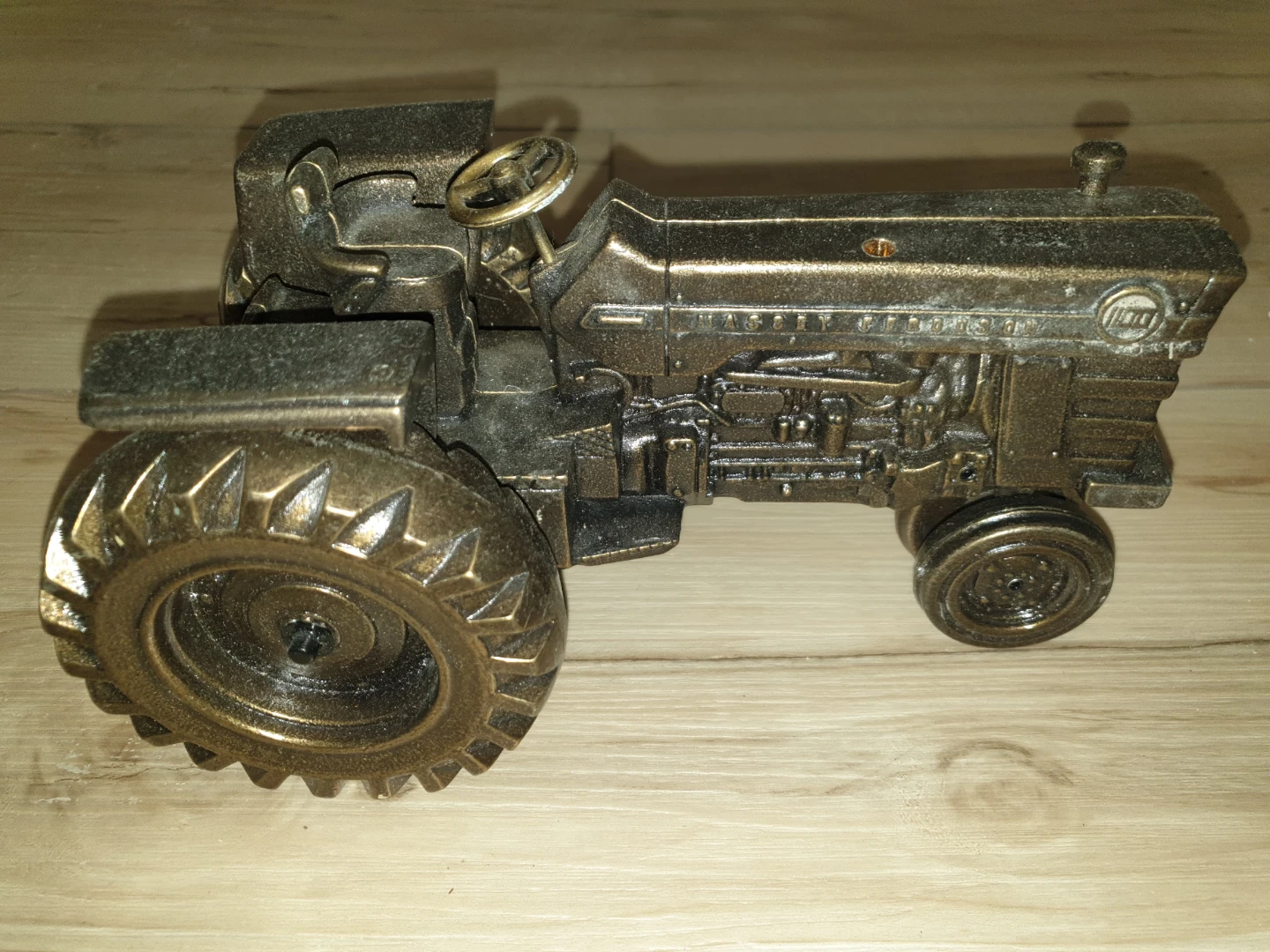 Collectible brass replica of a Massey Ferguson 1100 tractor - photo 4